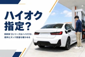 ガソリンスタンドで給油中の白いスポーツセダン